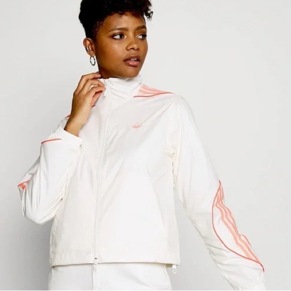 Adidas Originals women's track jacket in white with pink/coral stripe